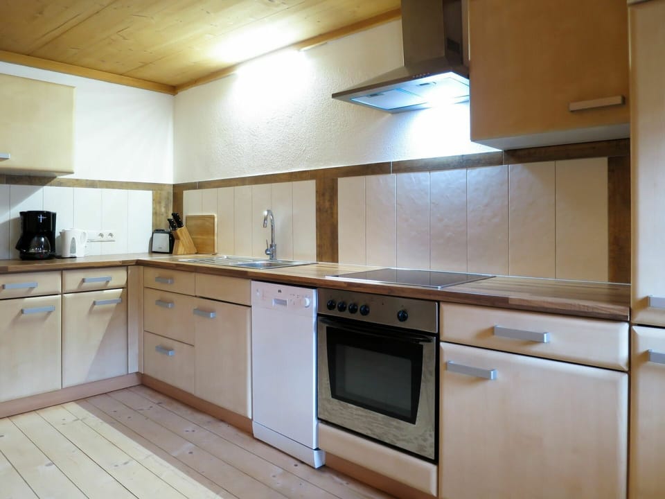 Countertop, Cabinetry, Furniture, Building, Kitchen Appliance, Kitchen Stove, Kitchen, Kitchen Sink, Tap, Home Appliance