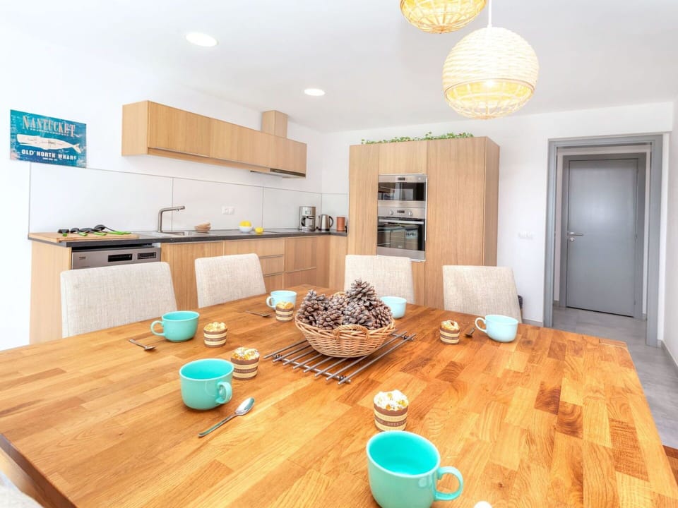 Room, Property, Furniture, Interior Design, Yellow, Turquoise, Floor, Wood Flooring, House, Table