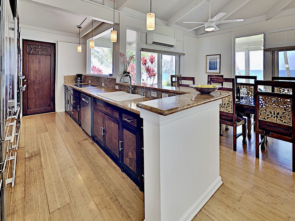 Kitchen - Open kitchen layout for the whole family to stay together while preparing meals.