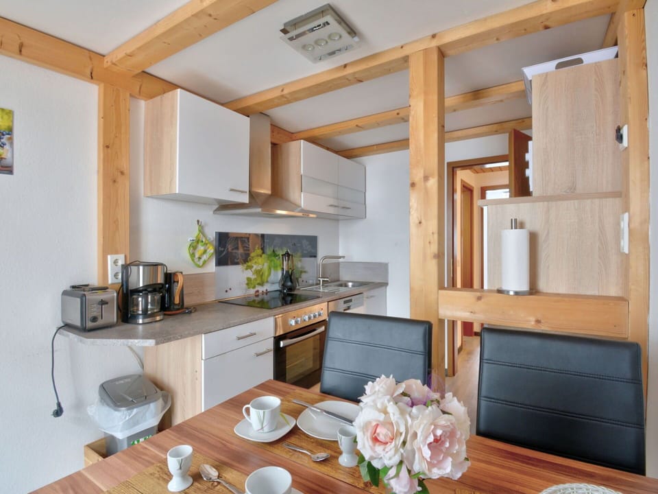 Cabinetry, Property, Furniture, Countertop, Wood, Kitchen, Interior Design, Table, Kitchen Appliance, Flooring