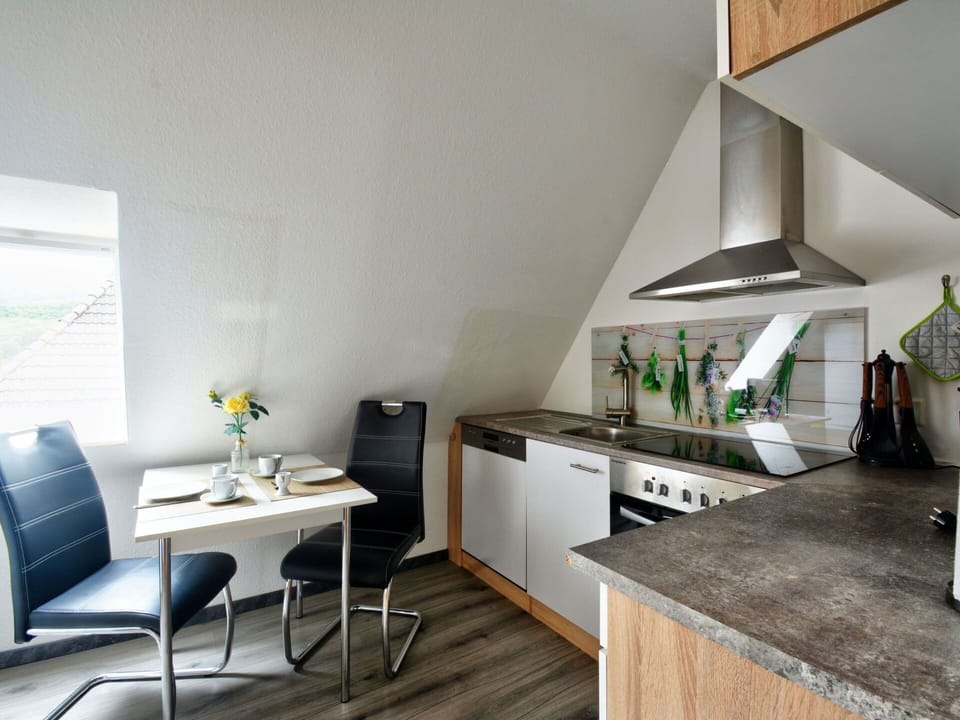 Furniture, Building, Table, Cabinetry, Countertop, Interior Design, Kitchen Appliance, Wood, Kitchen Stove, Flooring