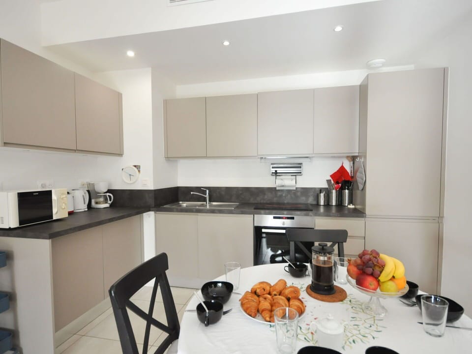 Countertop, Cabinetry, Food, Kitchen, Kitchen Stove, Kitchen Appliance, Home Appliance, Tableware, Wood, Floor