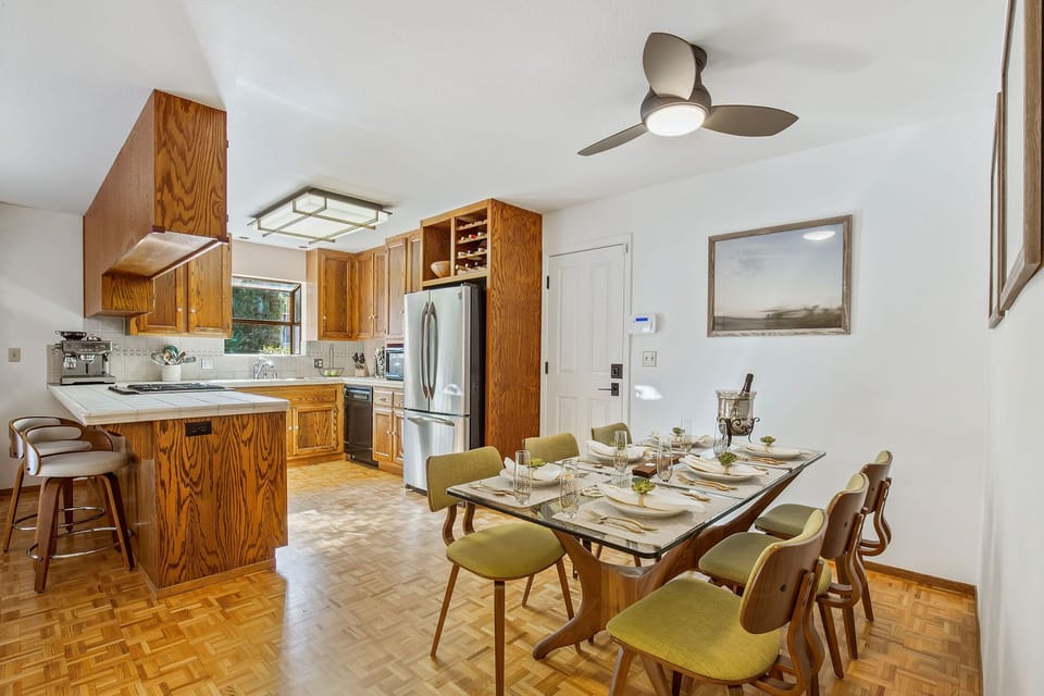 The open living, dining and kitchen area is great for everyone to hang out,
