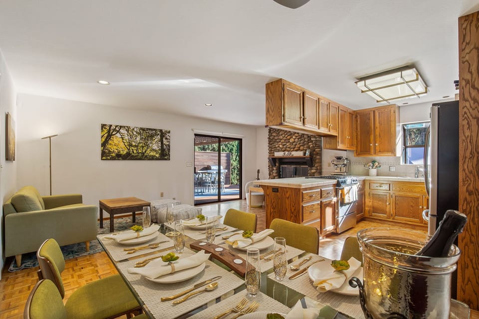 and serve up your culinary creations inside at the dining table that serves 8