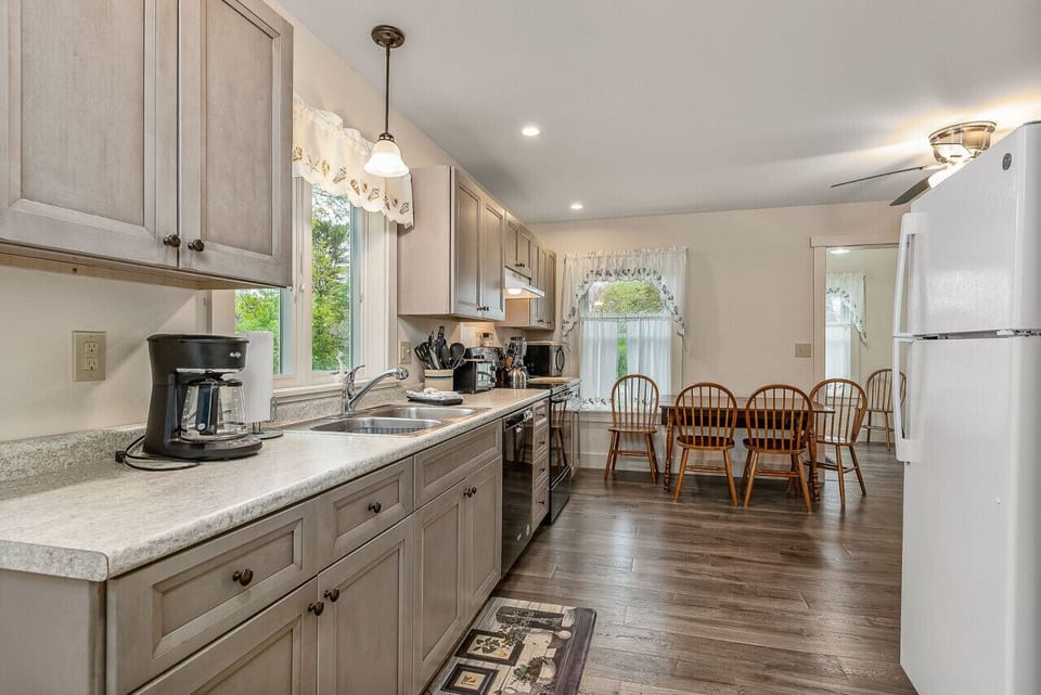 Brand new modern open concept kitchen with guest amenities