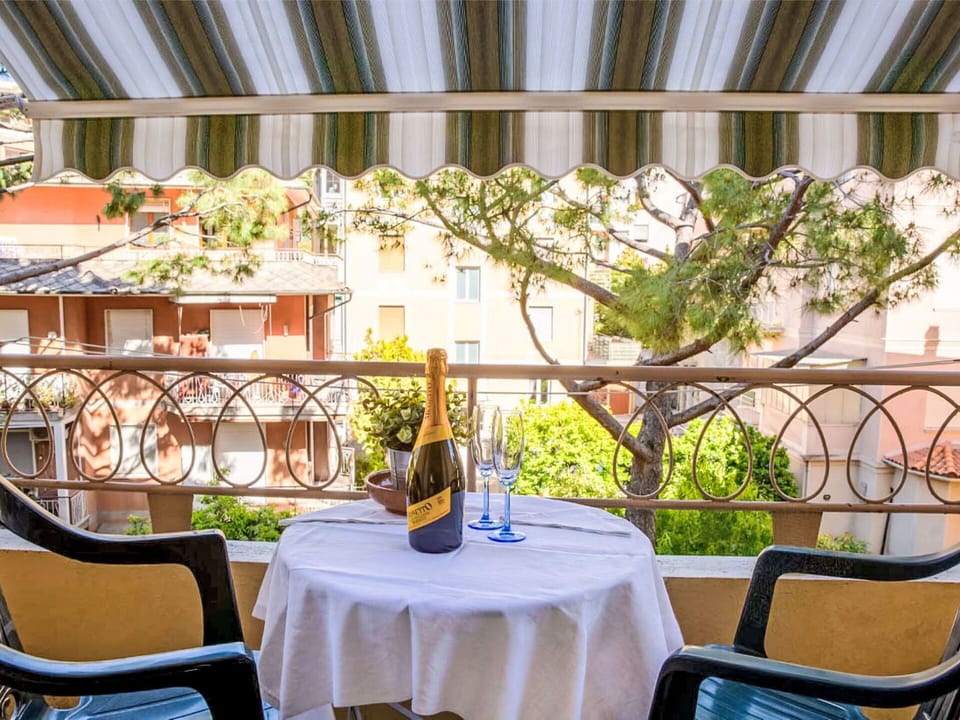 Balcony, Awning, Outdoor Furniture, Chair, Houseplant, Outdoor Table, Shade, Flowerpot, Restaurant, Porch