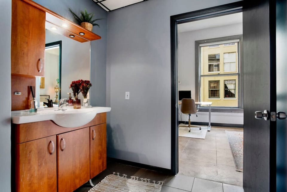 Pristine and well-maintained bathroom with a spacious shower.