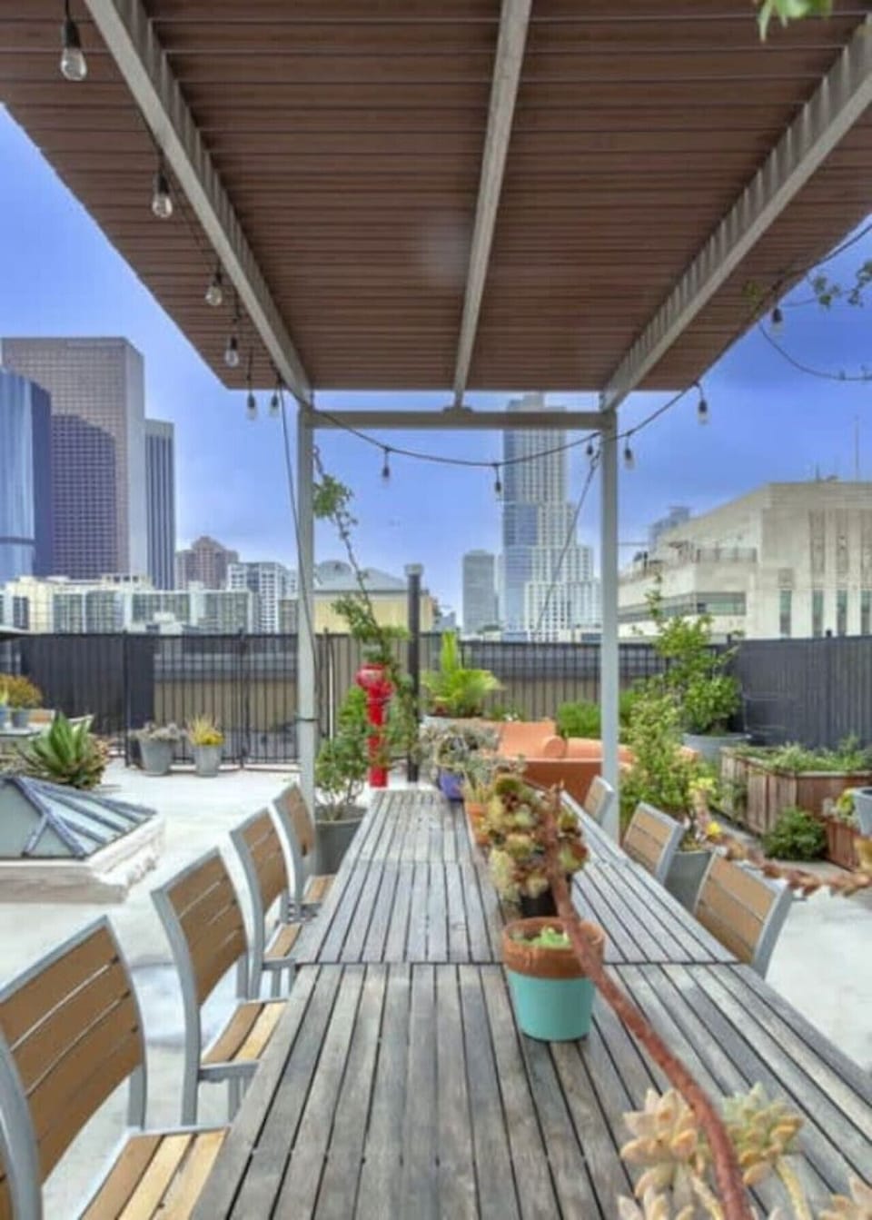 A stylish rooftop retreat with comfortable seating, ideal for socializing and enjoying the fresh air.