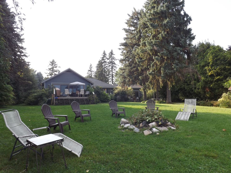 Huge lawn leading to the lake.