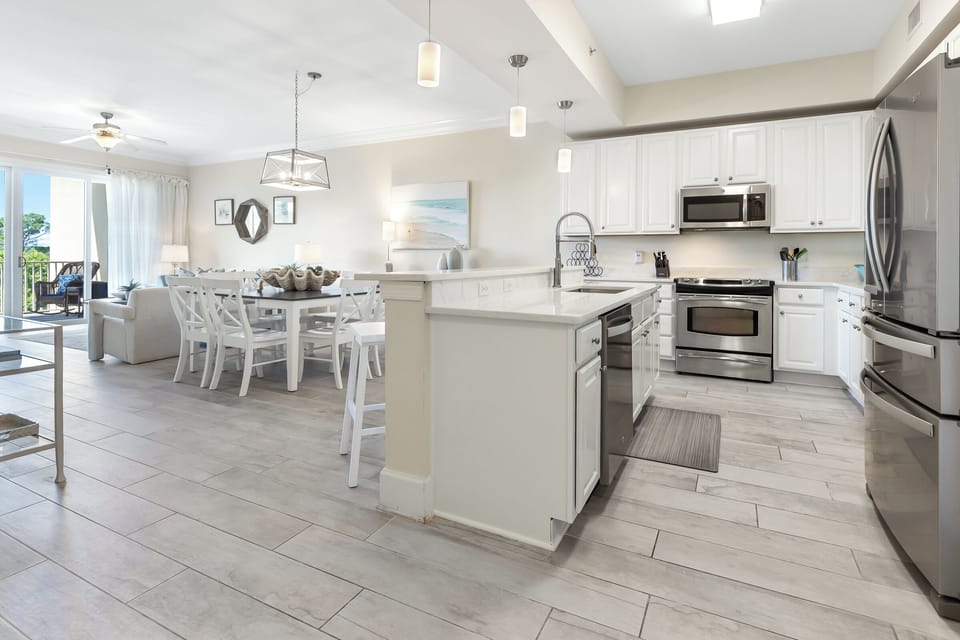Your bright, open-concept kitchen and dining space invites you to gather, cook, and share meals, all while soaking in the coastal light and comfortable, modern finishes that make this home feel effortlessly yours.