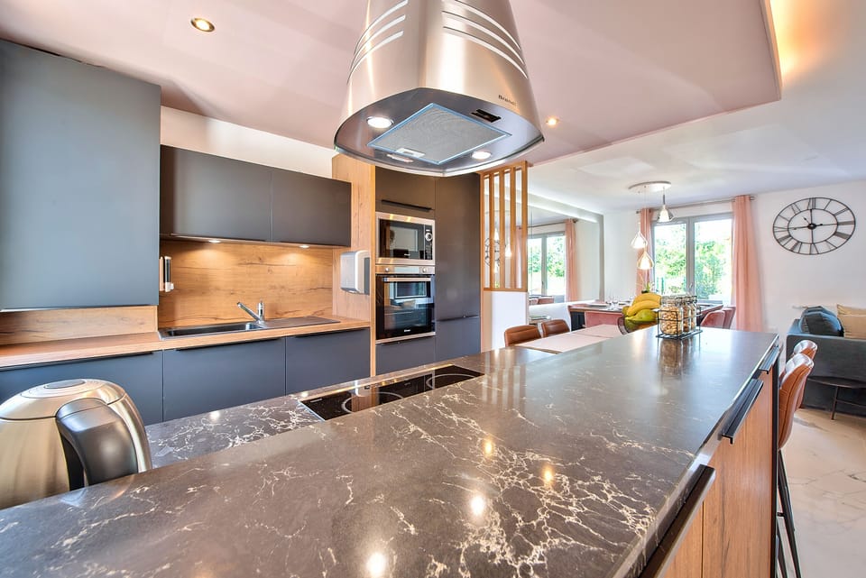 coffee machine, a toaster, a kettle, all the dishes and cooking utensils needed