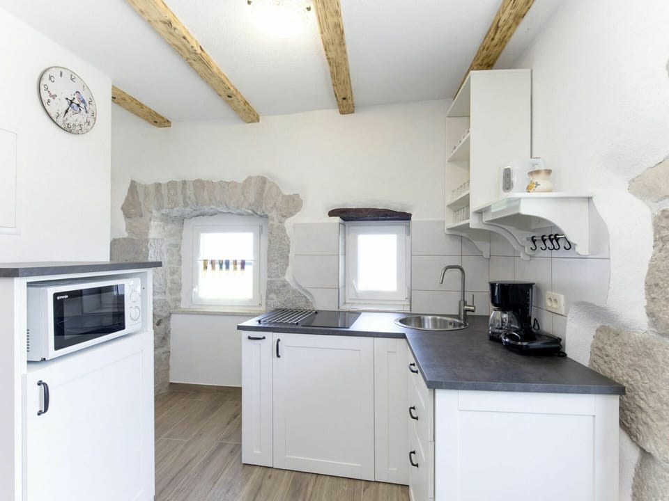 Room, Property, Kitchen, Furniture, Interior Design, Building, Countertop, House, Ceiling, Cabinetry