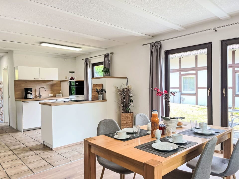 Wood, Flooring, Furniture, Kitchen & Dining Room Table, Interior Design, Floor, Table, Home, Dining Room, Ceiling