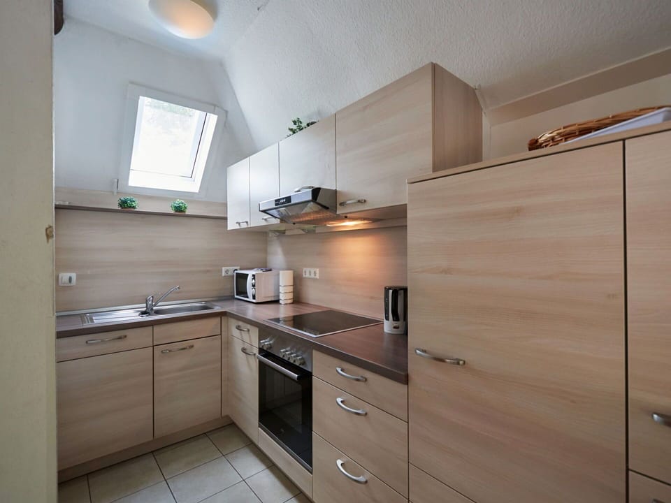 Cabinetry, Countertop, Property, Furniture, Building, Sink, Kitchen, Drawer, Kitchen Stove, Tap