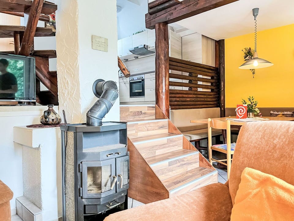 Furniture, Interior Design, Flooring, Wood, Floor, Room, Ceiling, Living Room, Couch, Lighting