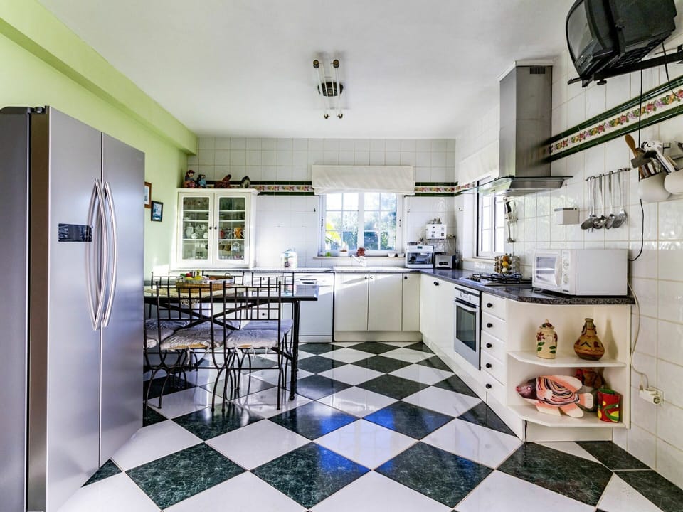 Countertop, Property, Furniture, Cabinetry, Kitchen, Couch, Interior Design, Shelf, Kitchen Appliance