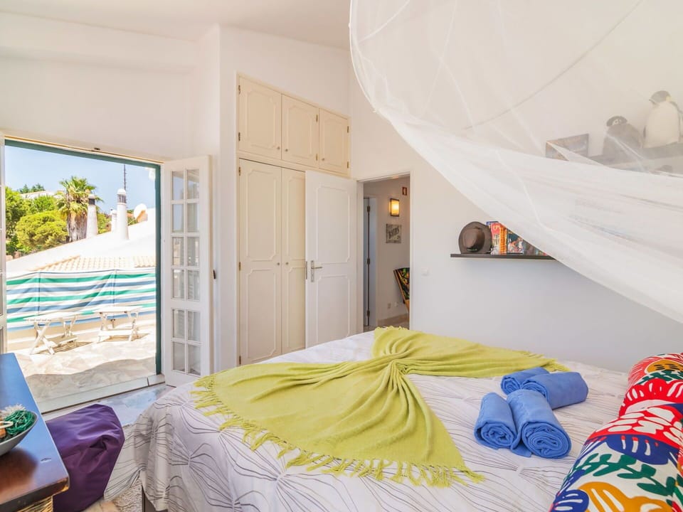 Bedroom, Room, Property, Bed, Furniture, Bed Sheet, Interior Design, Wall, Yellow, House
