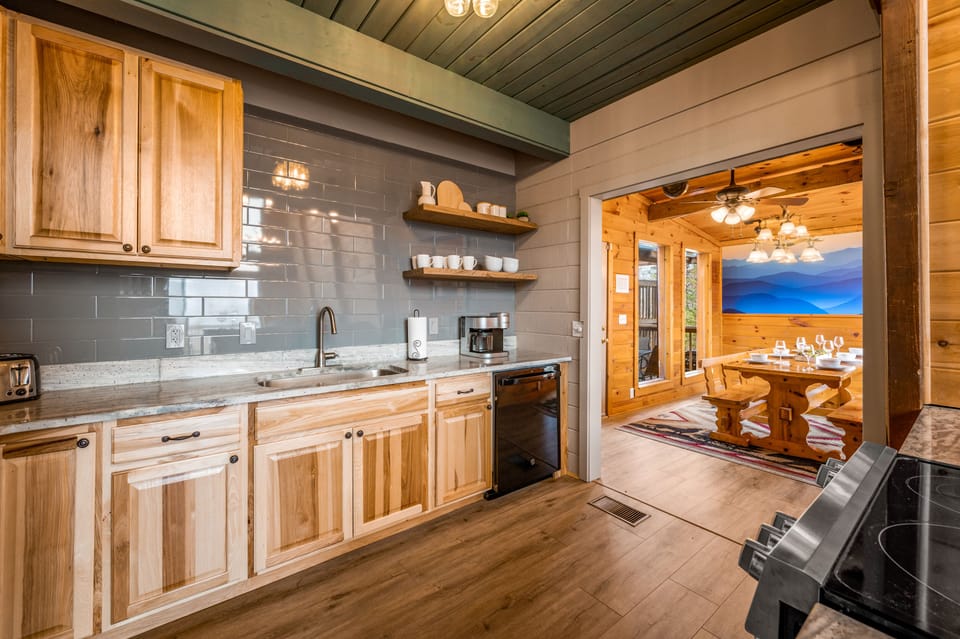 Luxury, open concept gourmet kitchen with a view of the Smokies! 