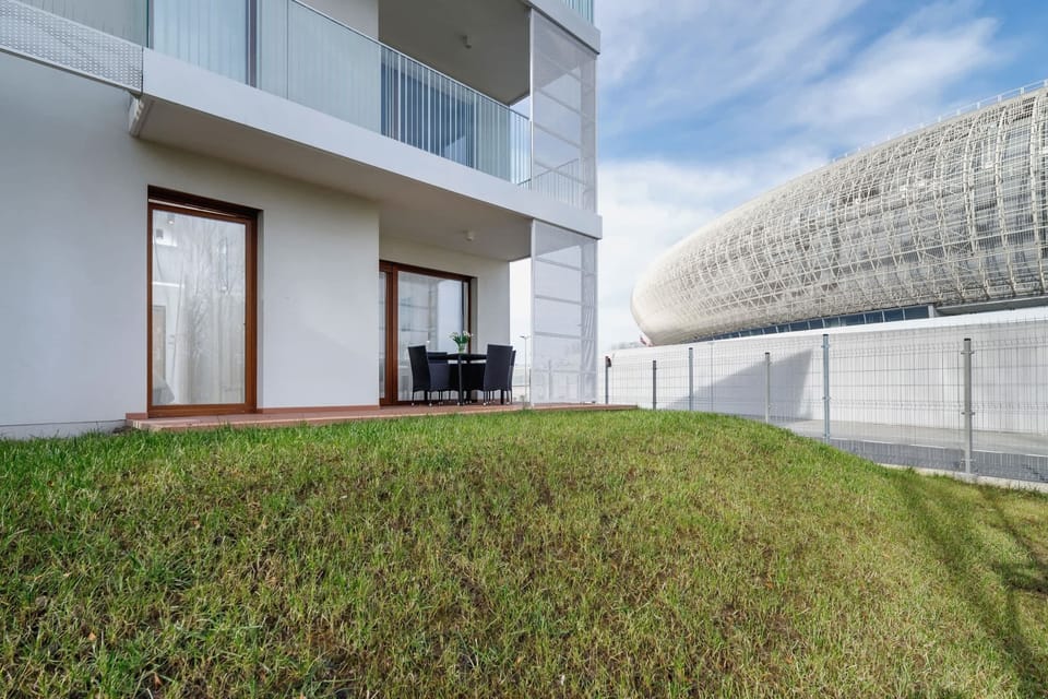 The terrace's stylish decor complements the apartment's modern design.