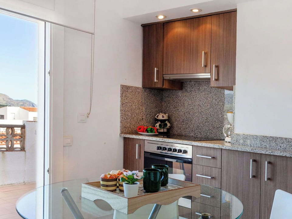 Kitchen, Kitchen Appliance, Countertop, Major Appliance, Interior Design, Furniture, Cabinetry, Flooring, Home, Home Appliance
