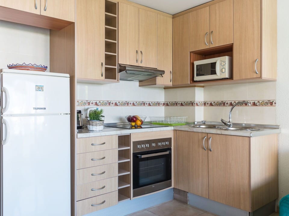 Cabinetry, Room, Furniture, Property, Kitchen, Countertop, Major Appliance, Interior Design, Building, Home Appliance