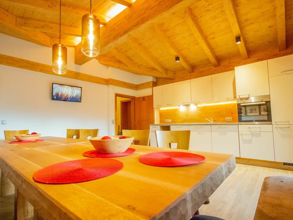 Property, Furniture, Table, Orange, Lighting, Building, Wood, Interior Design, House, Chair