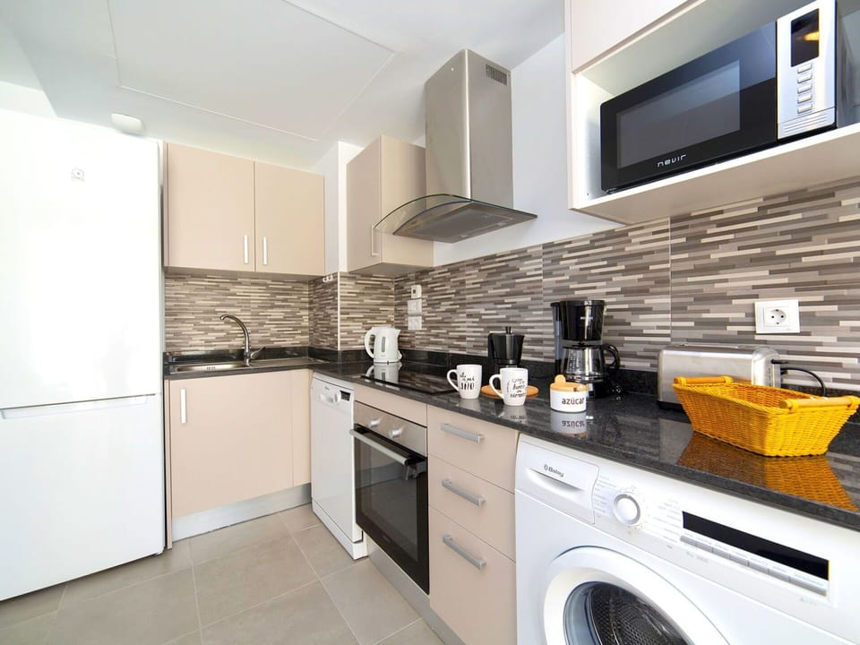 Property, Countertop, Room, Kitchen, Cabinetry, Furniture, Interior Design, Building, Yellow, House