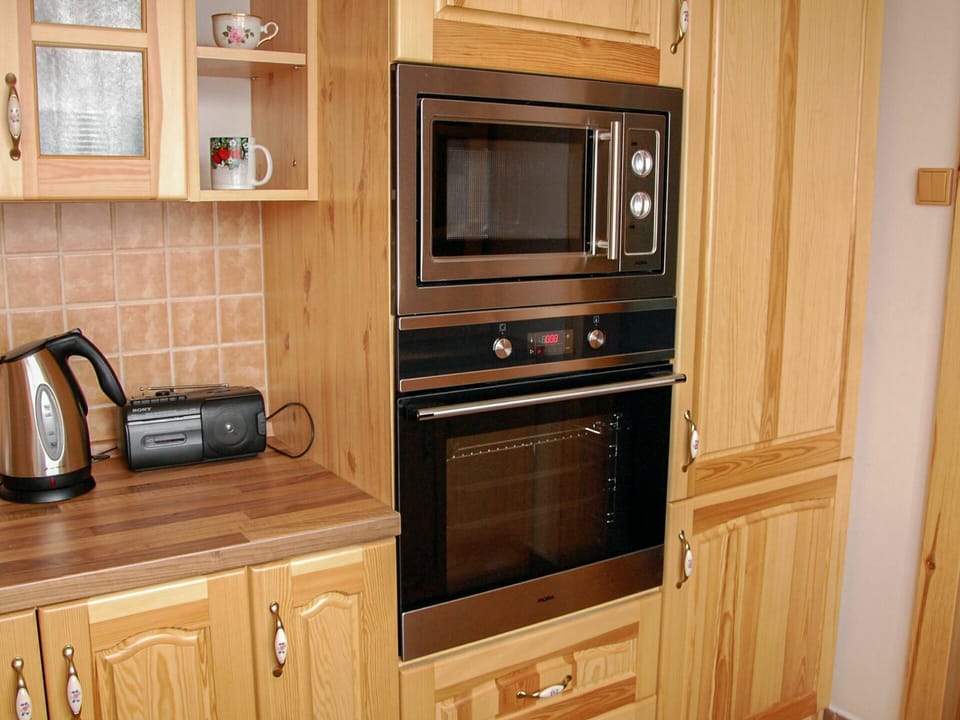 Cabinetry, Furniture, Property, Countertop, Home Appliance, Kitchen Appliance, Wood, Interior Design, Kitchen, Floor