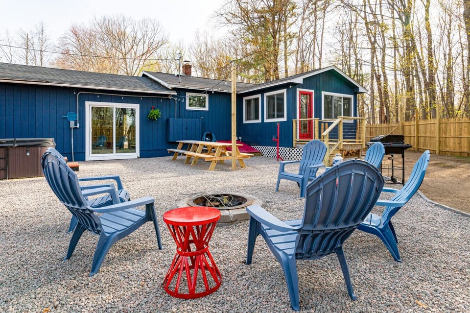 Gather around the outdoor firepit for a cozy evening under the stars.