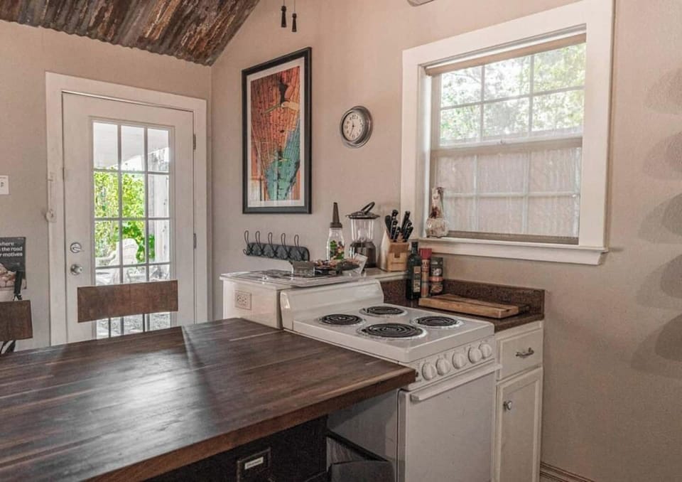The kitchen comes equipped with all the appliances you could need for your stay in the cabin