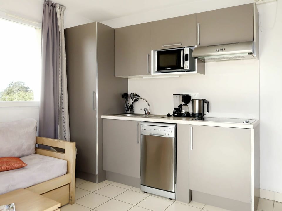 Room, Furniture, Property, Kitchen, Cabinetry, Interior Design, Building, Major Appliance, House, Kitchen Stove
