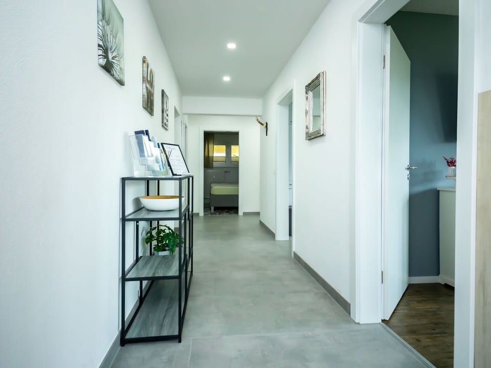 Property, Picture Frame, Building, Door, Interior Design, Floor, Wood, Houseplant, Flooring