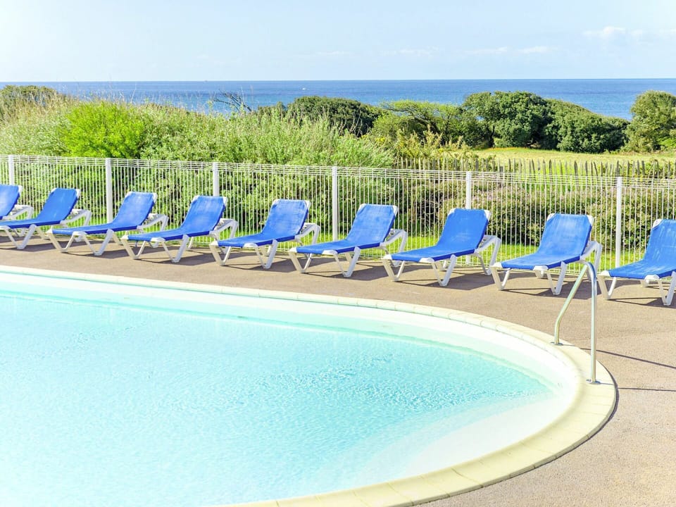 Water, Sky, Property, Swimming Pool, Azure, Blue, Outdoor Furniture, Building, Sunlounger, Chair