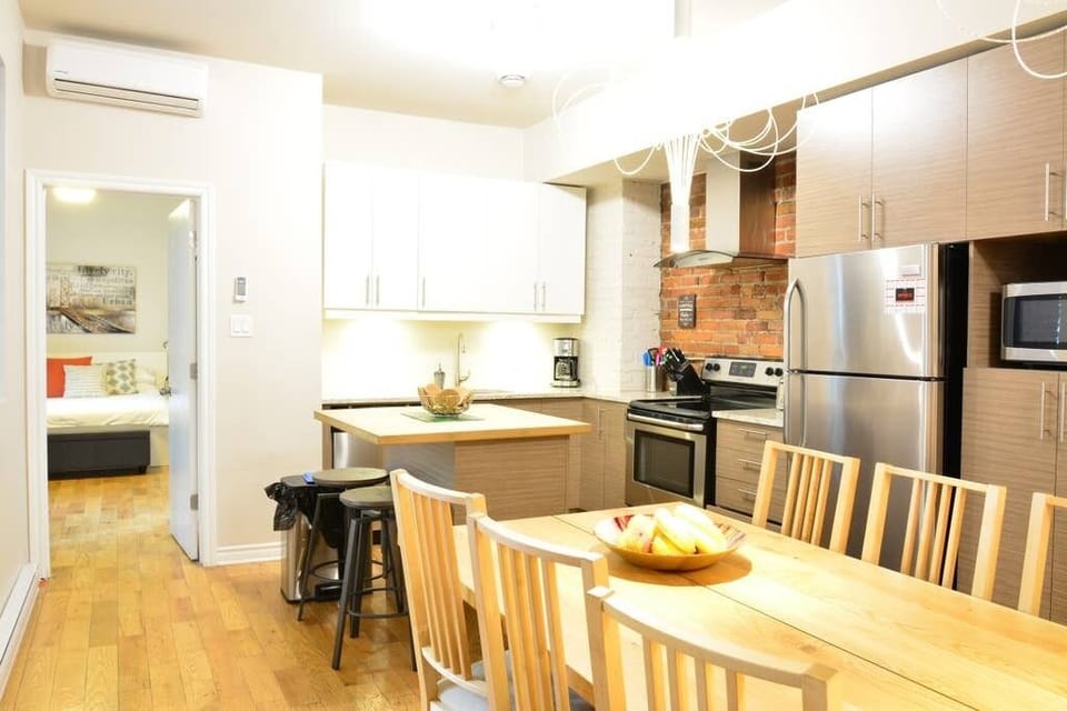 The kitchen has all appliances, including a dishwasher.