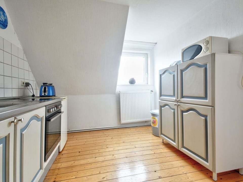 Cabinetry, Building, Wood, Kitchen Appliance, Home Appliance, Lighting, Kitchen, Interior Design, Flooring