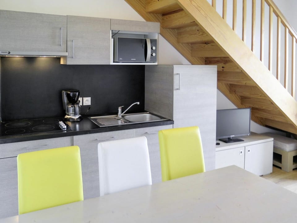 Countertop, Room, Property, Kitchen, Cabinetry, Interior Design, Yellow, Furniture, House, Building