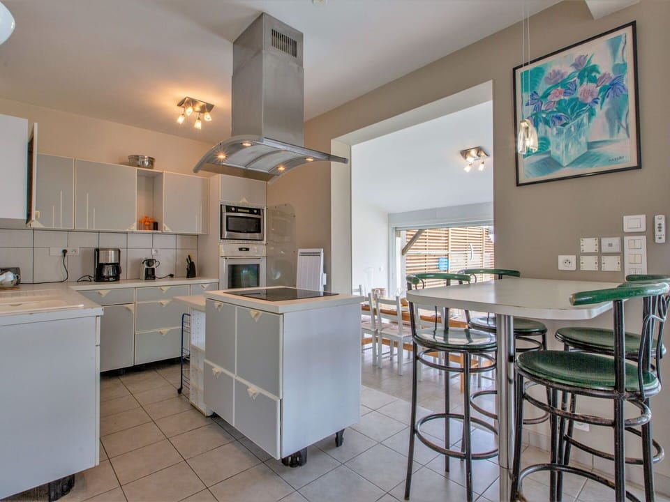 Furniture, Cabinetry, Table, Kitchen, Chair, Countertop, Building, Interior Design, Wood, Floor