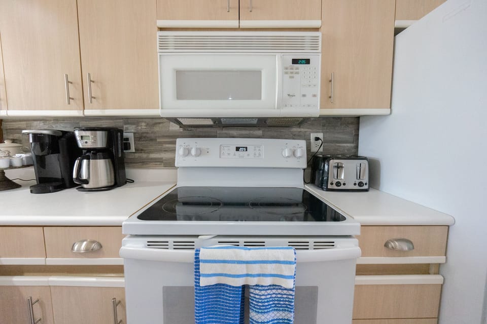 Kitchen Stocked with Utensils and Dinnerware