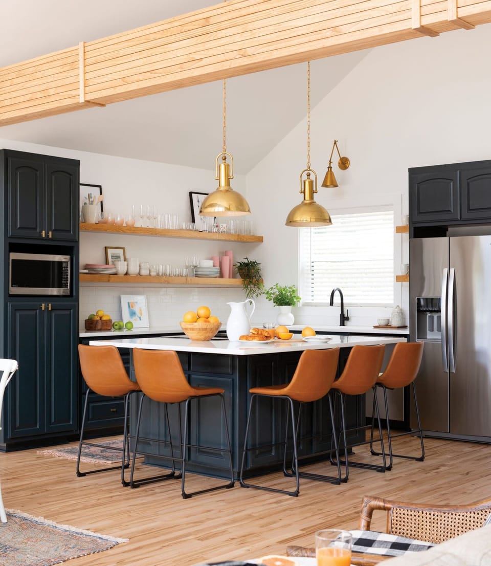 Kitchen with plenty of bar seating and dining table