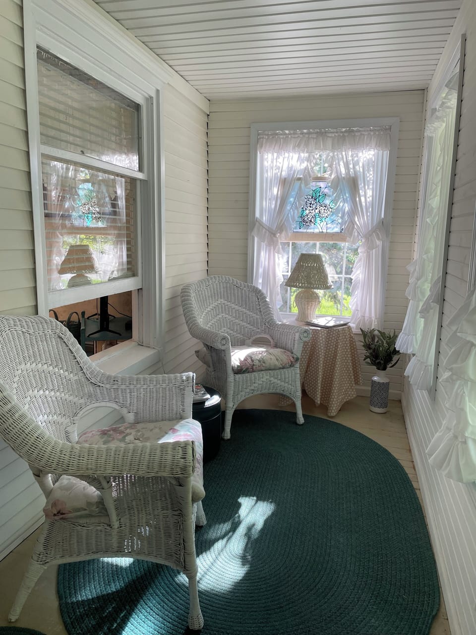 Front of house enclosed porch.