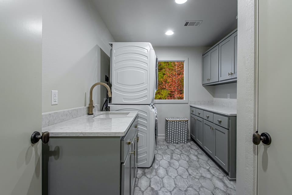 Laundry Room with Two (2) Washing Machines & Two (2) Dryers for Twice the Fun!