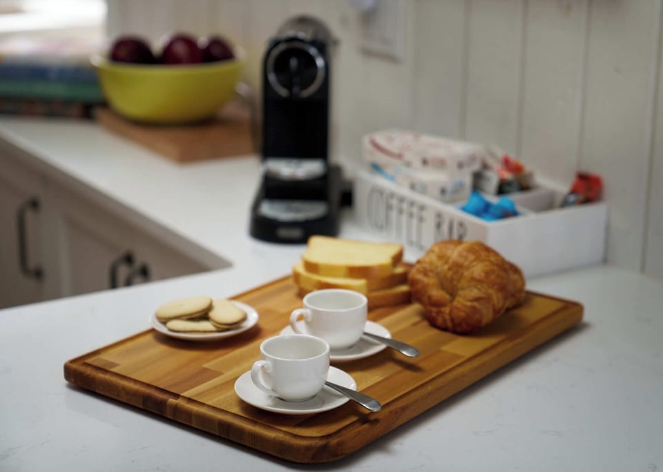 Your morning coffee is on us – Nespresso machine and pods included.