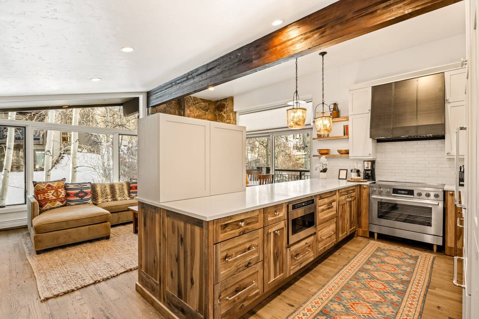 The spacious kitchen is fully stocked with everything you need to prepare meals during your stay.