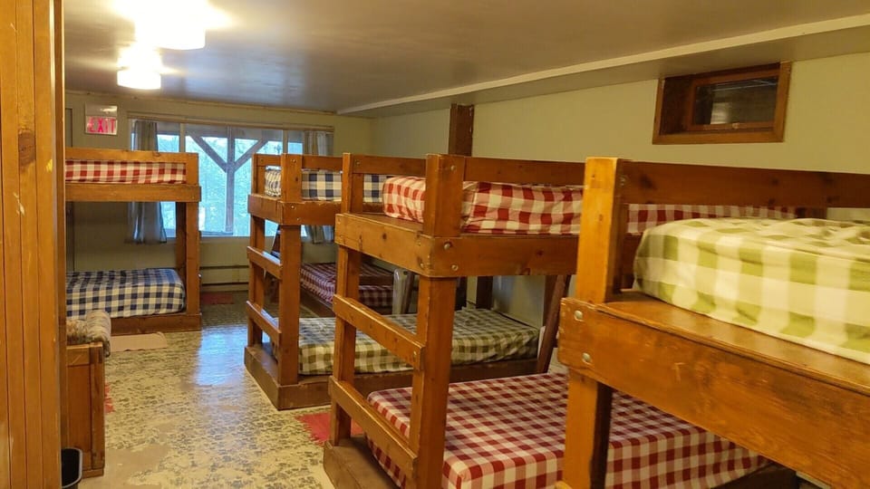 Sleeping accommodations are in two community-style bunk rooms in the basement. 