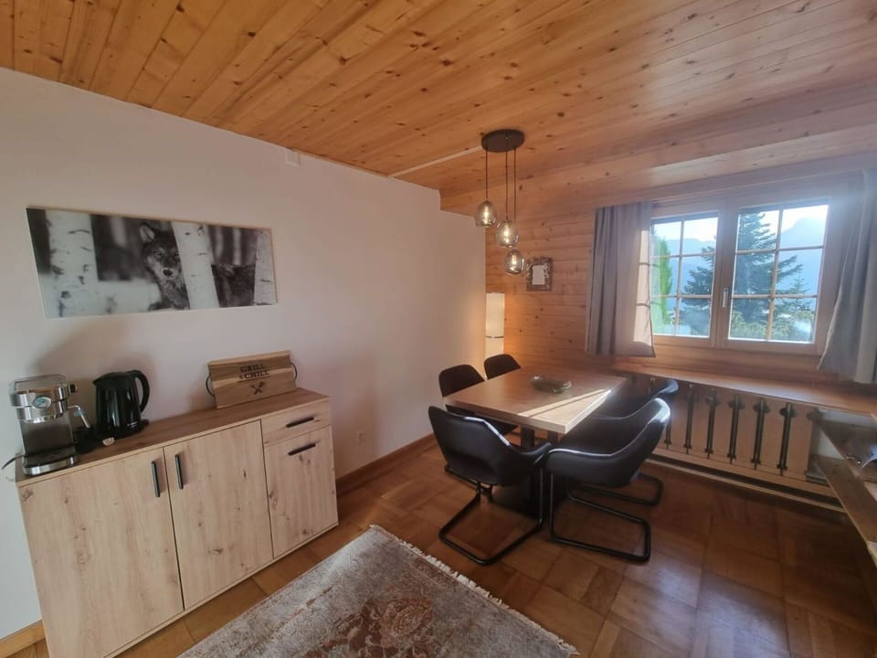 Furniture, Window, Cabinetry, Wood, Building, Flooring, Interior Design, Floor, Wood Stain, Comfort