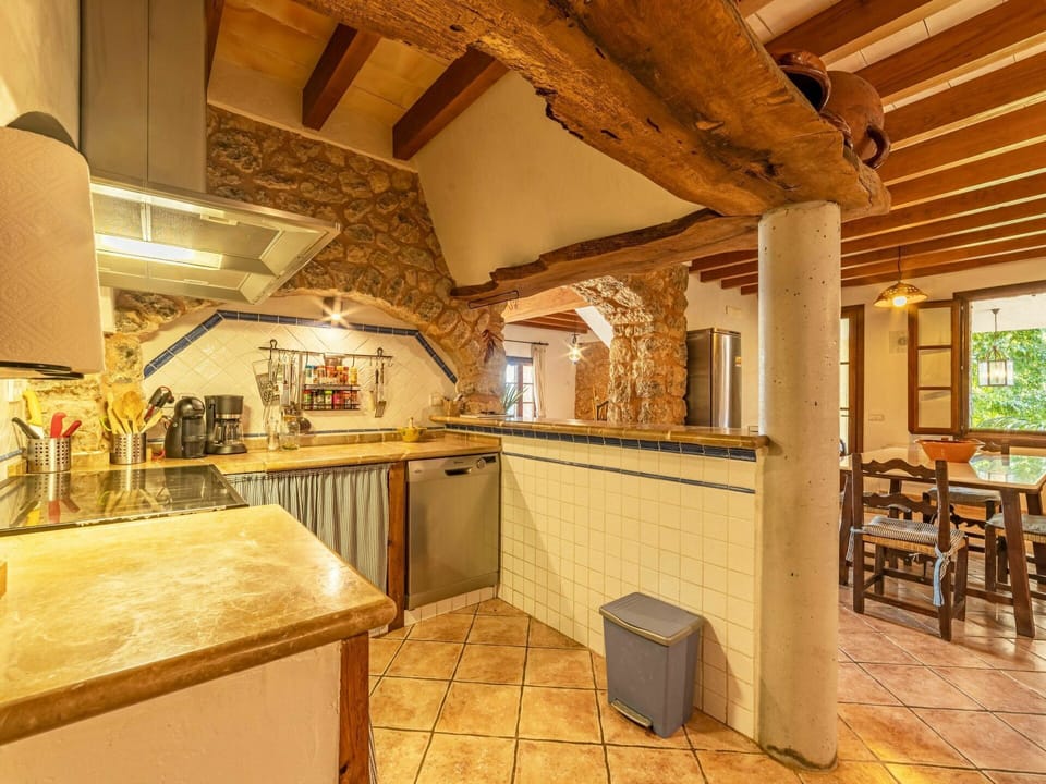 Furniture, Property, Cabinetry, Countertop, Wood, Table, Lighting, Interior Design, Kitchen, Flooring