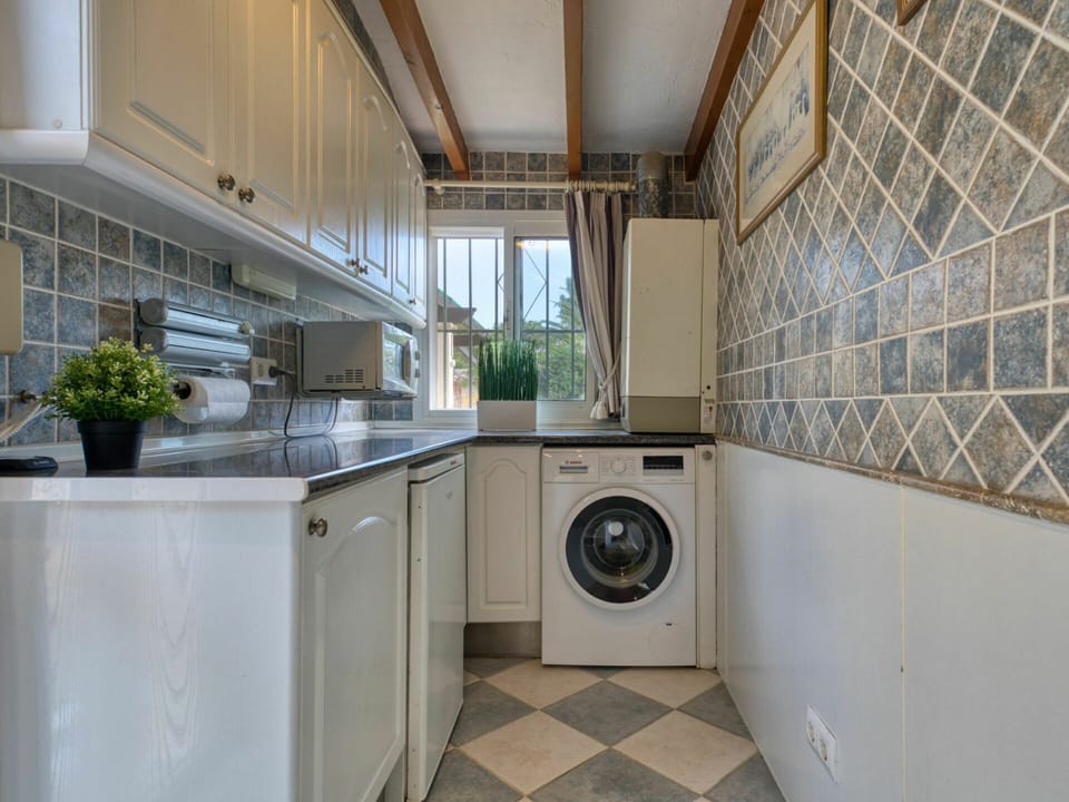 Laundry Room, Plant, Property, Washing Machine, Cabinetry, Clothes Dryer, Flowerpot, Building, Laundry, Home Appliance