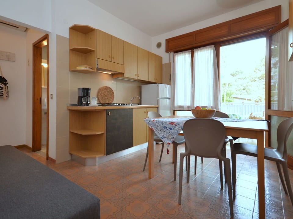 Property, Furniture, Table, Cabinetry, Chair, Countertop, Wood, Interior Design, Kitchen, Floor