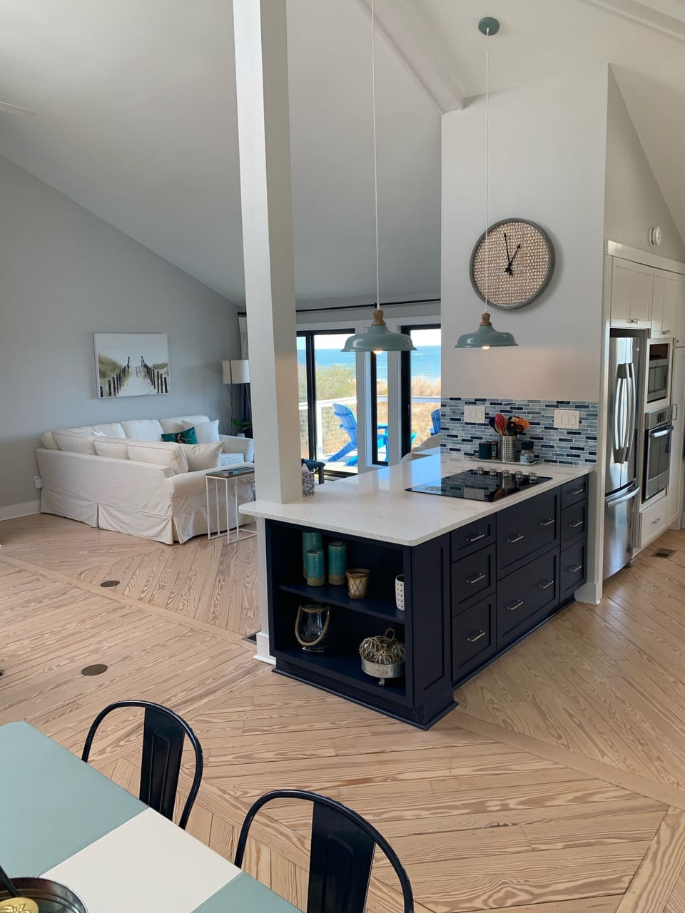 Open floor plan with high ceilings and beautiful views of the bay
