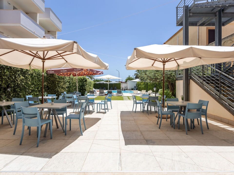 Property, Furniture, Table, Sky, Plant, Umbrella, Chair, Shade, Outdoor Table, Outdoor Furniture